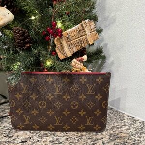 Monogram wristlet with  strap